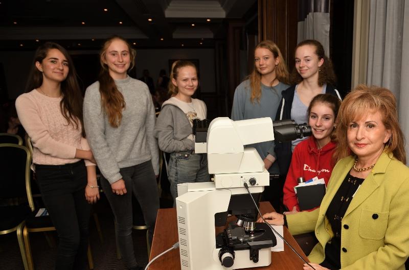 Students waiting to view cells through the microscope.jpg