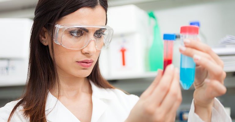 female_virologist_test_tubes_virology_785x400px.jpg