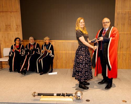Dr Sally Ashton receiving her award at the New Fellows Ceremony in February
