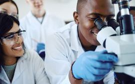 Trainees looking down a microscope stock image_low res.jpg