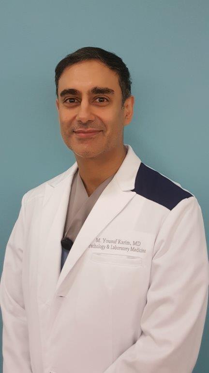 Dr Karim headshot.jpg