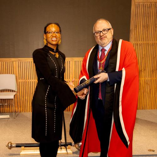 Dr Vanessa Djabety receives her award from Dr Bernie Croal at the New Fellows Ceremony