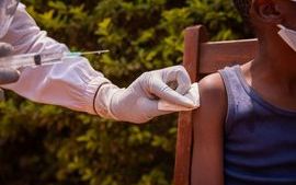 doctors-hands-holding-syringe-vaccinating.jpg