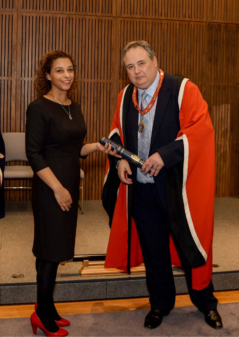 Alex Yates at the New Fellows' Ceremony at the Royal College of Pathologists in March 2022 receiving her certificate from College President Professor Mike Osborn